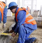 Builder working on site with CSCS card